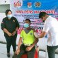 Ketua PWI Minsel memantau kegiatan Baksos Vaksinasi di aula Waleta Pemkab Minsel 