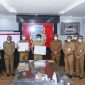 Bupati Minsel Franky Wongkar bersama Wali Kota Manado Andrei Angouw melakukan penandatanganan MoU Pelayanan Metrologi Legal