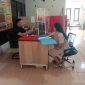 Salah satu perangkat Desa Tumpaan Baru saat mempolisikan Plt Kumtua Tumpaan Baru di Polres Minsel