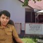 Foto: Kantor PMD Minsel (background), foto Kadis PMD Ever Poluakan